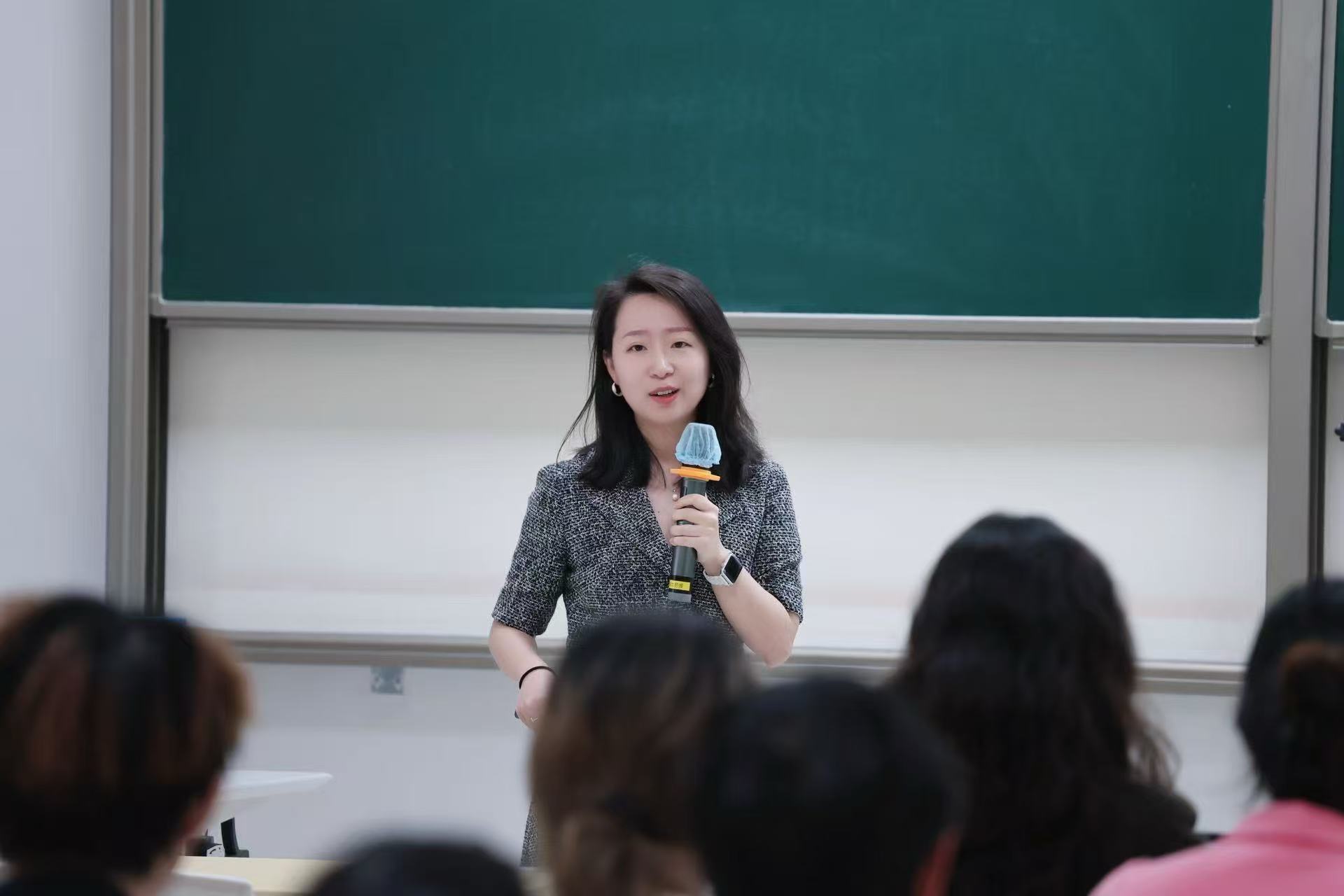 Sihan Zhou giving a talk at Beijing Normal University
